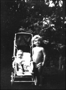 David Lowe and his sister Jessica as children, with pram
