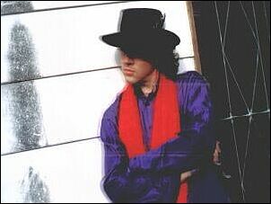 David Lowe in purple shirt and red scarf, photo Jane Foggon